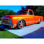 Blue Ghost Pearl on this orange Chevy Truck.