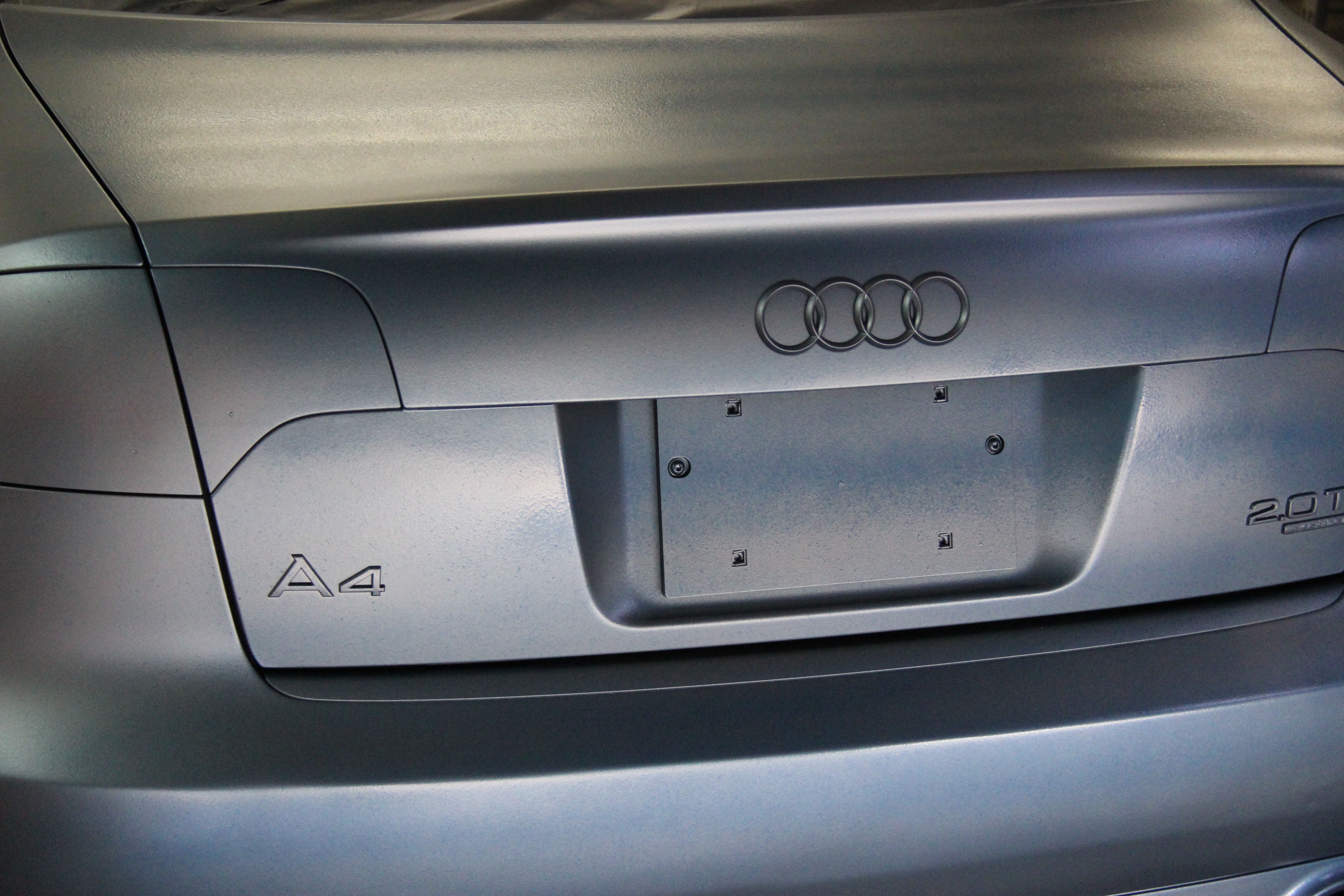 Pewter Titanium Candy Pearls ® being plasti dipped on an Audi